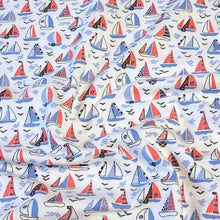 Load image into Gallery viewer, Fun Red, White, and Blue Sail Boats. Cotton Spandex Euro Knit Fabric. Nice Quality Soft Fabric, 4-way Stretch. Sold by the 1/2 yard.
