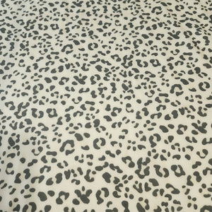 French Terry Stretch Knit Fabric, Cream/Gray Leopard Cheetah Print, Poly Rayon Spandex Tri Blend.  2-way stretch. Sold by the 1/2 yard