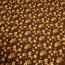 Load image into Gallery viewer, Rib Knit Fabric Brown Rib Knit Fabric with Yellow and Pink Floral Print on Ribbed Poly Spandex 4 Way Stretch Fabric. Sold by the 1/2 Yard.
